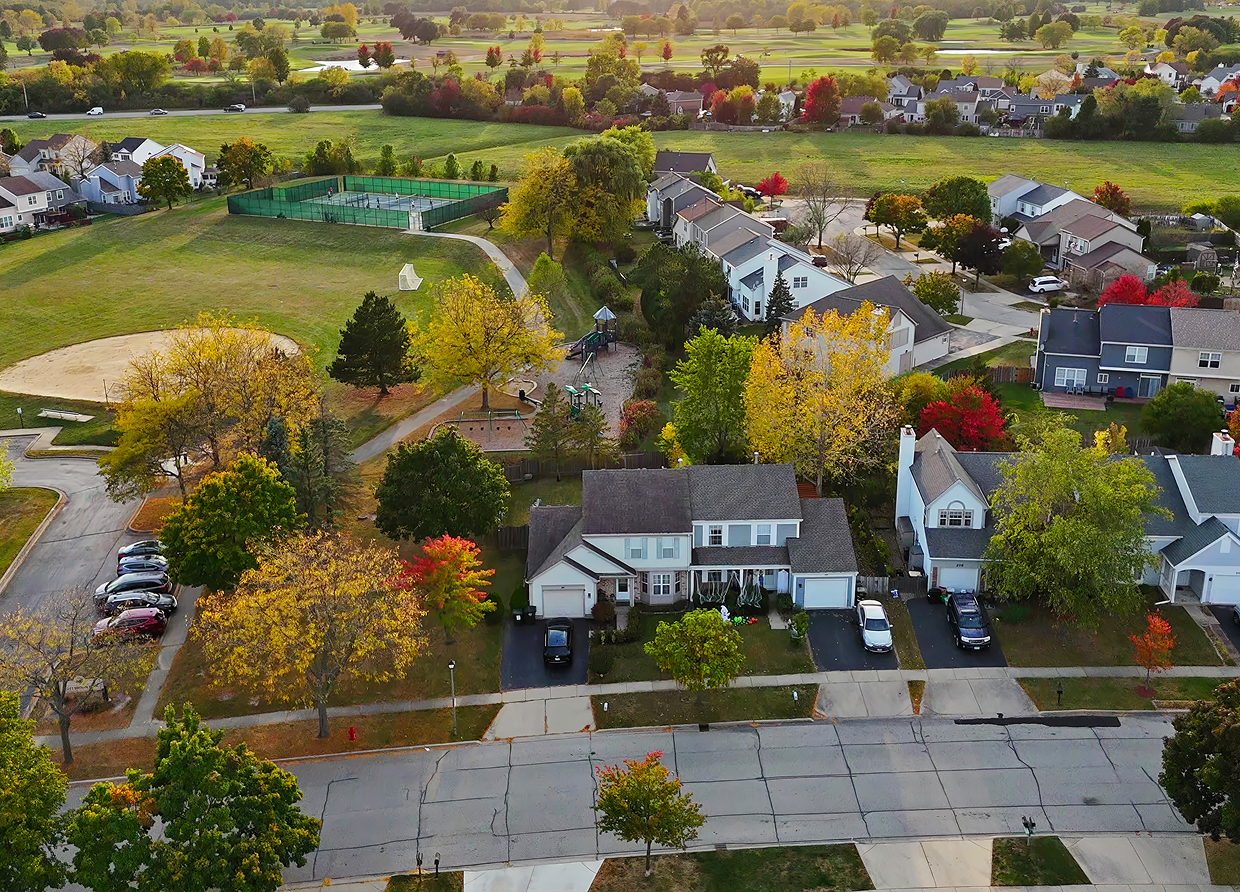 Suburban neighborhood with autumn trees