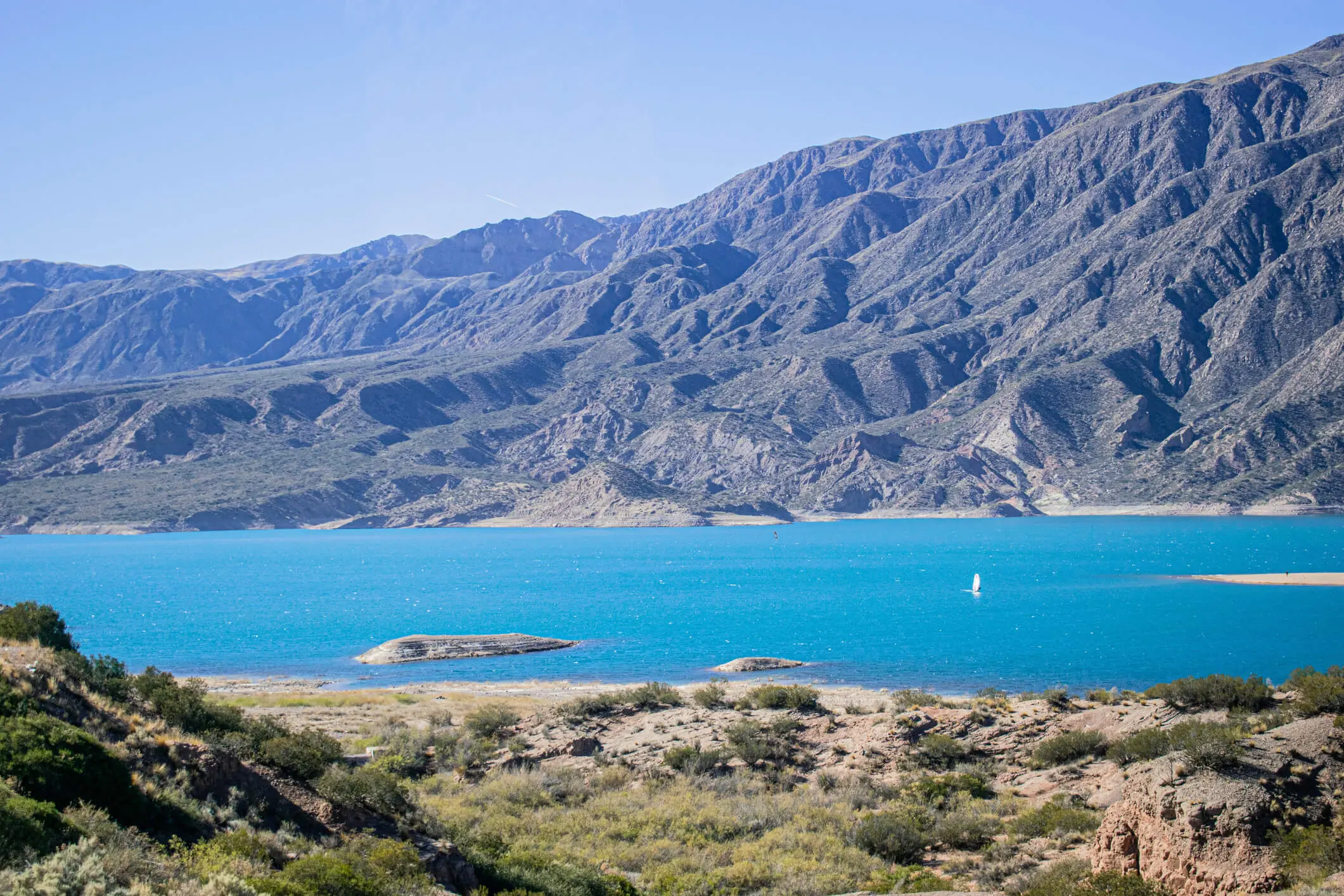 Mountain lake with clear blue water