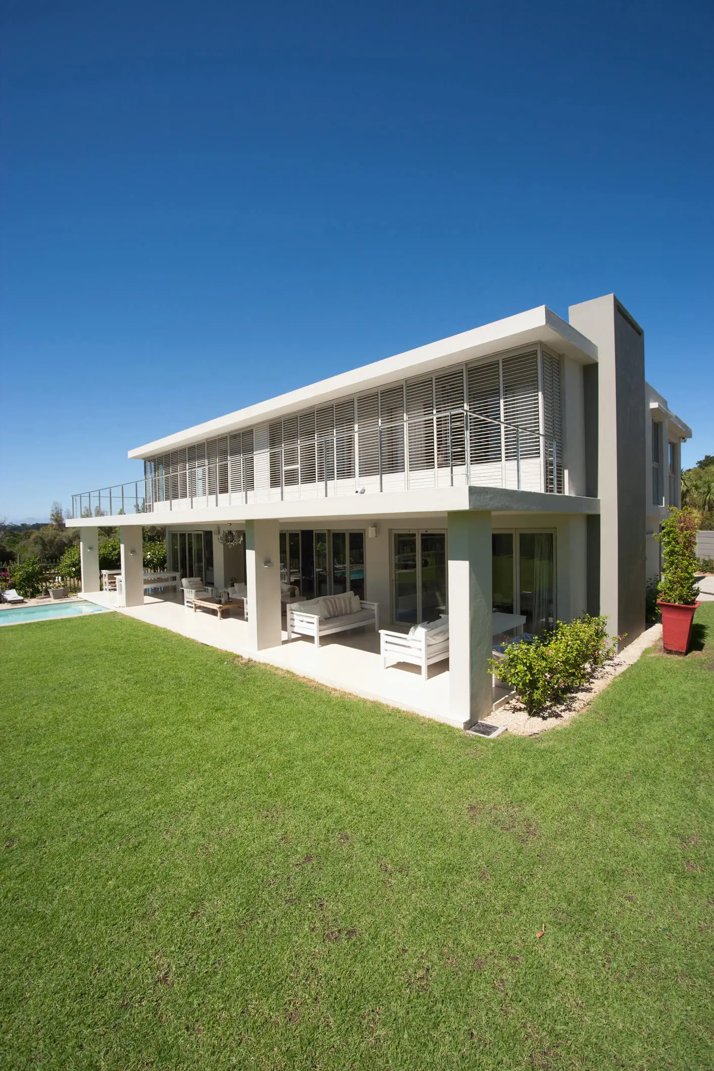 Spacious house under clear blue sky