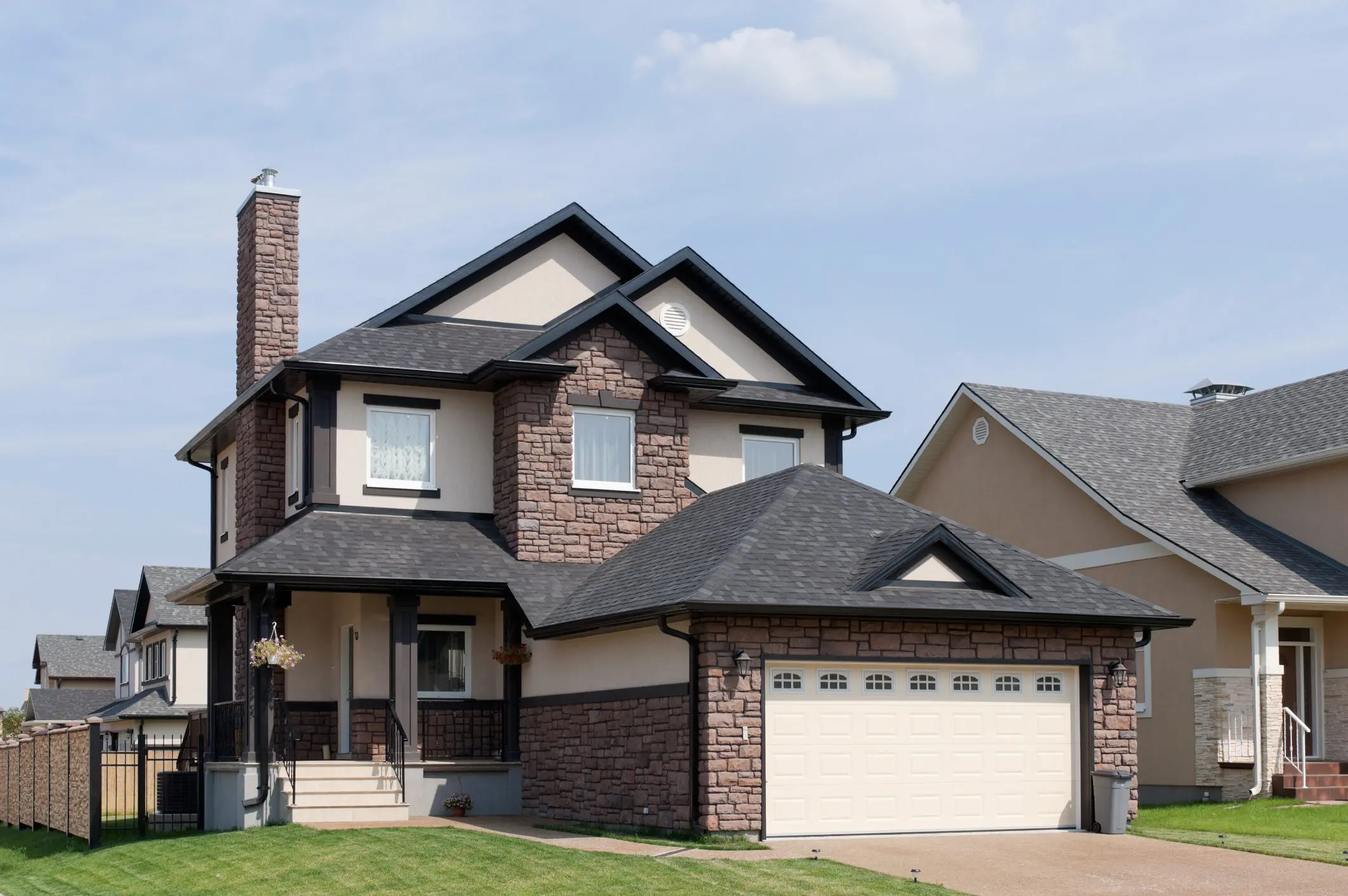Two-story house with stone facade