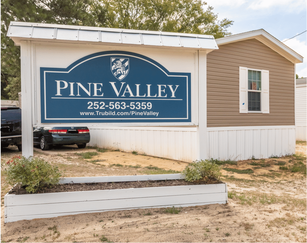 Pine Valley sign near mobile home