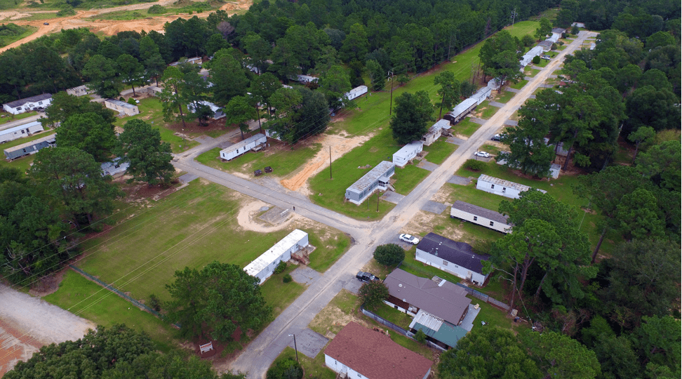 Trailer homes surrounded by trees